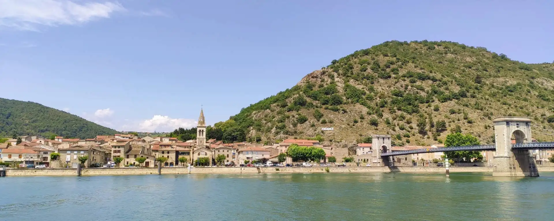 View of the village of Andance in the Ardèche and the Rhône river from the Drôme